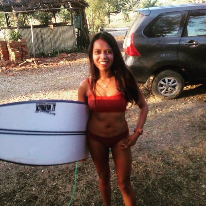 Lisa with surfboard